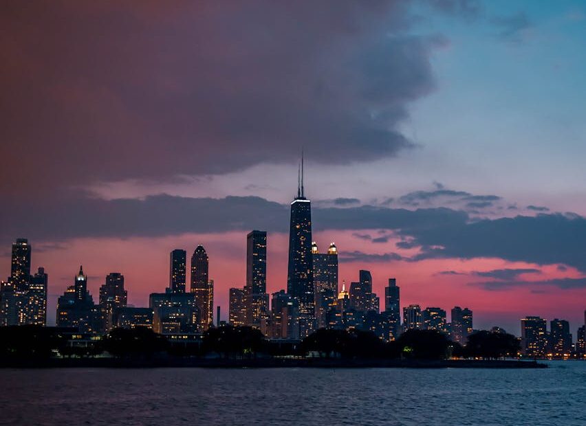 high rise buildings near body of water