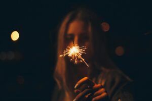 woman holding firecracker