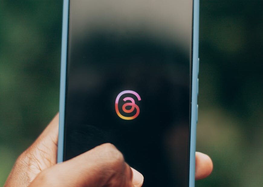 man hand holding smartphone